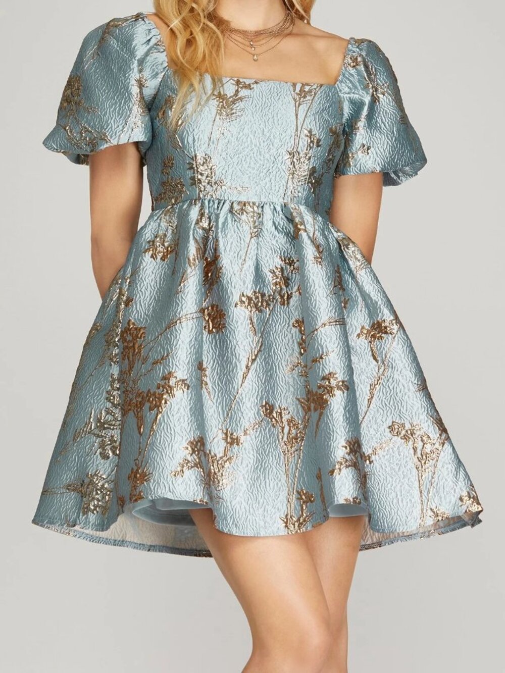 Blue and gold jacquard baby doll style mini dress